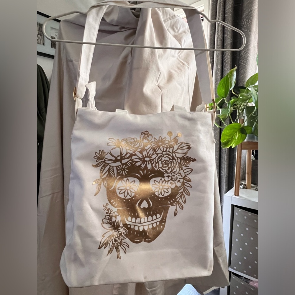 Paper Source tote with gold skull and flowers